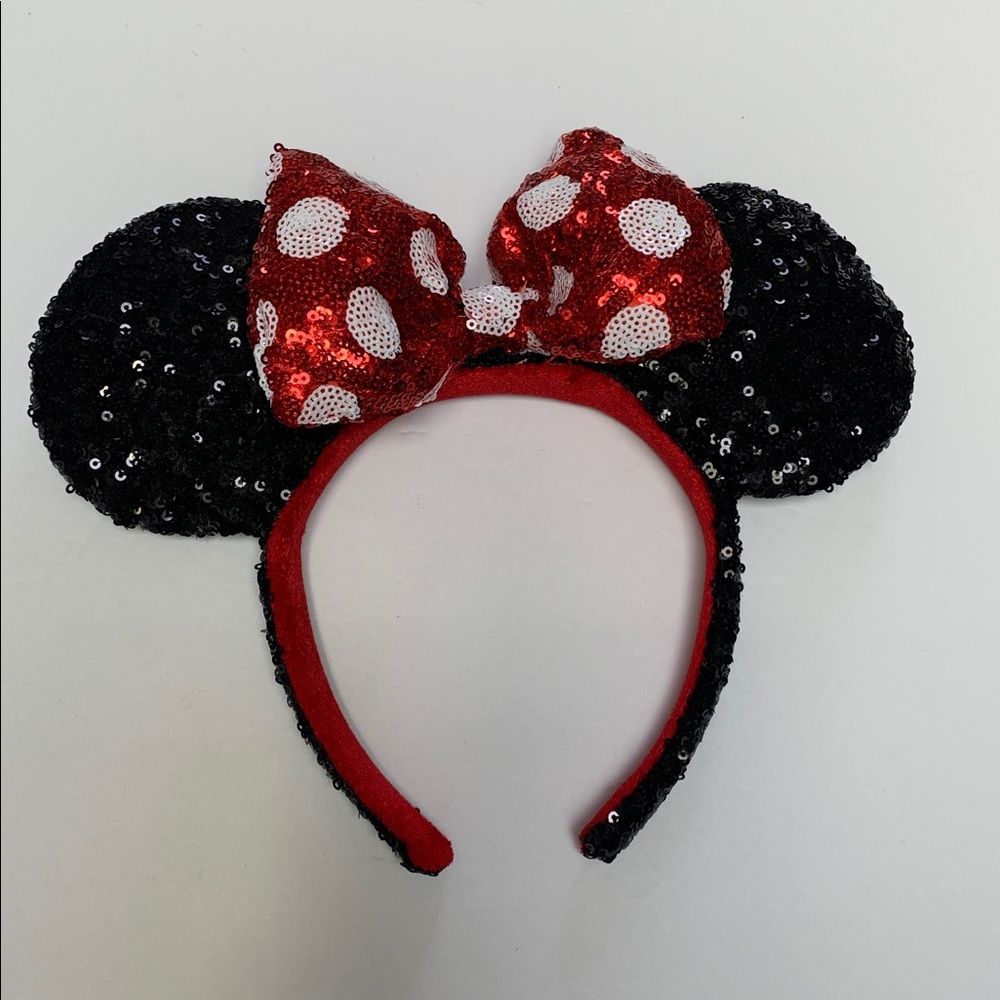 Disney Sparking Sequin Minnie Mouse Ears Headband with white polka dot bow.